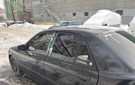 Mazda Protege, 1999 год, 210 000 рублей, 9 фотография