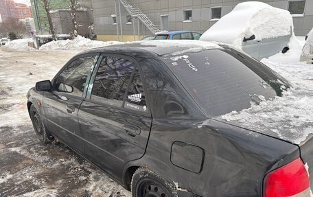 Mazda Protege, 1999 год, 210 000 рублей, 10 фотография