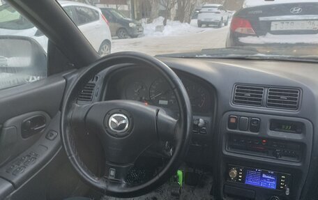Mazda 323, 1998 год, 200 000 рублей, 9 фотография