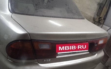 Mazda 323, 1996 год, 150 000 рублей, 20 фотография