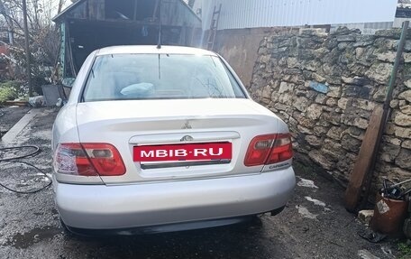 Mitsubishi Carisma I, 2003 год, 145 000 рублей, 5 фотография