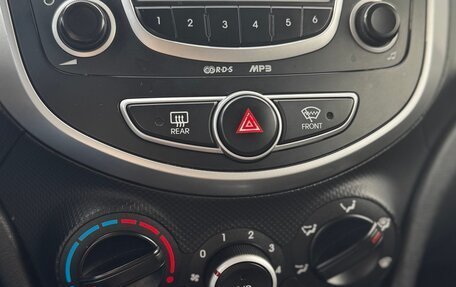 Hyundai Solaris II рестайлинг, 2011 год, 590 000 рублей, 13 фотография