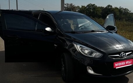 Hyundai Solaris II рестайлинг, 2011 год, 590 000 рублей, 12 фотография