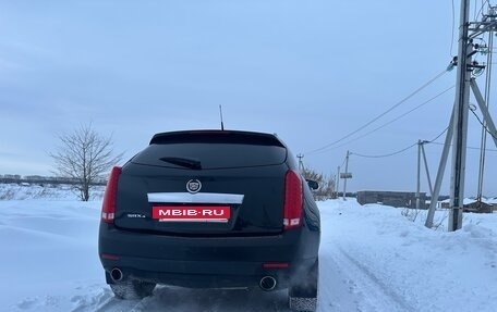 Cadillac SRX II рестайлинг, 2011 год, 980 000 рублей, 2 фотография