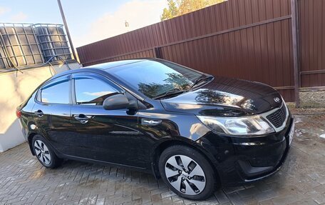 KIA Rio III рестайлинг, 2013 год, 815 000 рублей, 9 фотография