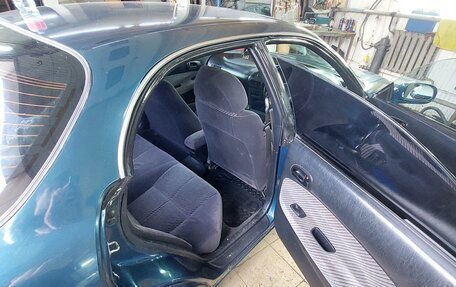 Toyota Sprinter Marino, 1992 год, 350 000 рублей, 22 фотография