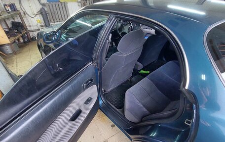 Toyota Sprinter Marino, 1992 год, 350 000 рублей, 23 фотография