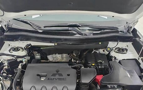 Mitsubishi Outlander III рестайлинг 3, 2022 год, 1 635 000 рублей, 14 фотография