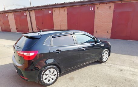 KIA Rio III рестайлинг, 2013 год, 700 000 рублей, 18 фотография
