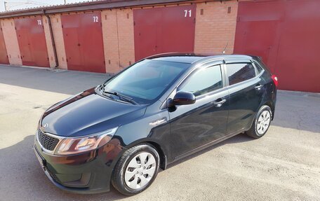 KIA Rio III рестайлинг, 2013 год, 700 000 рублей, 20 фотография