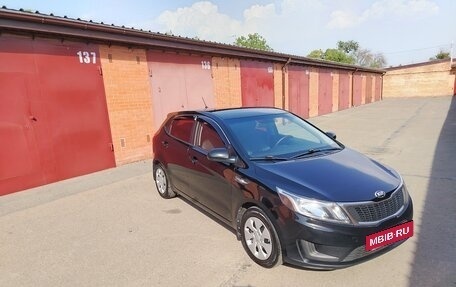 KIA Rio III рестайлинг, 2013 год, 700 000 рублей, 19 фотография