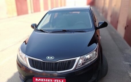 KIA Rio III рестайлинг, 2013 год, 700 000 рублей, 6 фотография