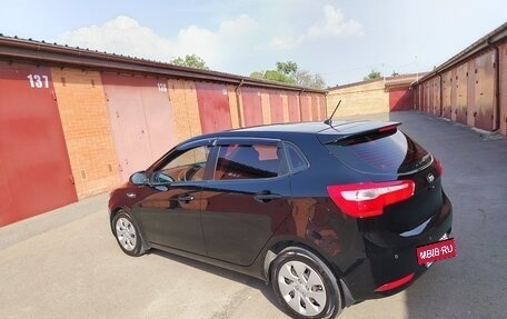 KIA Rio III рестайлинг, 2013 год, 700 000 рублей, 21 фотография