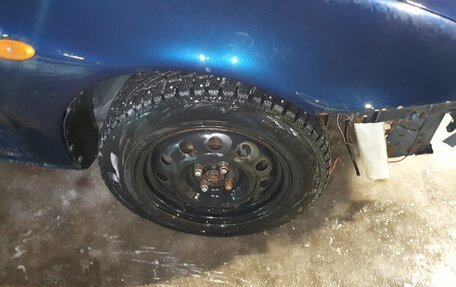 Mazda 323, 1998 год, 110 000 рублей, 15 фотография