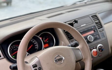 Nissan Tiida, 2010 год, 870 000 рублей, 9 фотография