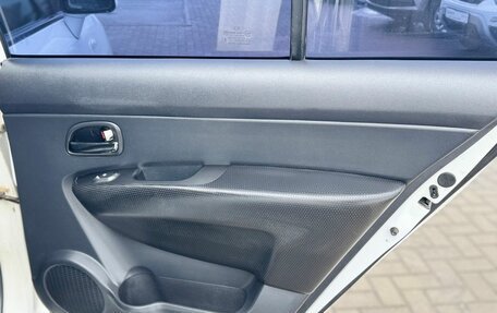 KIA Carens III (RP), 2011 год, 850 000 рублей, 14 фотография