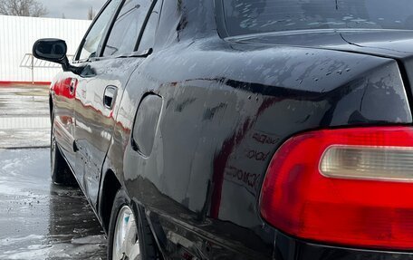 Mitsubishi Carisma I, 2003 год, 600 000 рублей, 6 фотография