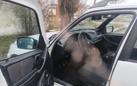 Chevrolet Niva I рестайлинг, 2012 год, 650 000 рублей, 4 фотография