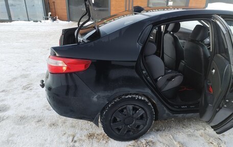 KIA Rio III рестайлинг, 2011 год, 650 000 рублей, 21 фотография