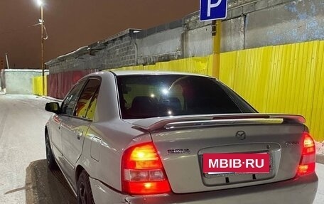 Mazda Familia, 1999 год, 170 000 рублей, 8 фотография