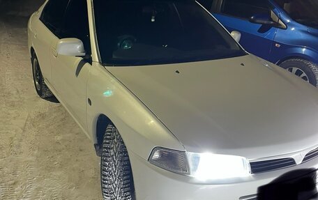 Mitsubishi Mirage VI рестайлинг, 2000 год, 420 000 рублей, 1 фотография