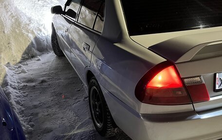 Mitsubishi Mirage VI рестайлинг, 2000 год, 420 000 рублей, 8 фотография