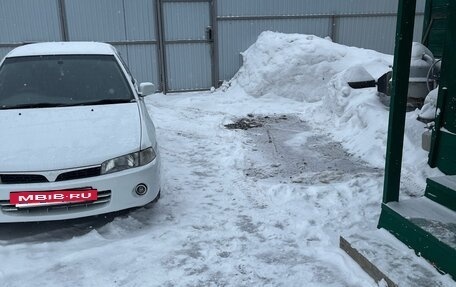 Mitsubishi Mirage VI рестайлинг, 2000 год, 420 000 рублей, 11 фотография