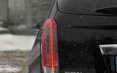 Cadillac SRX II рестайлинг, 2010 год, 990 000 рублей, 9 фотография