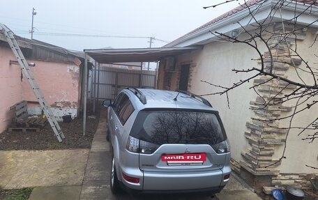 Mitsubishi Outlander III рестайлинг 3, 2010 год, 900 000 рублей, 4 фотография