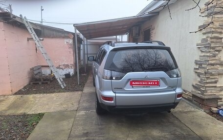 Mitsubishi Outlander III рестайлинг 3, 2010 год, 900 000 рублей, 3 фотография