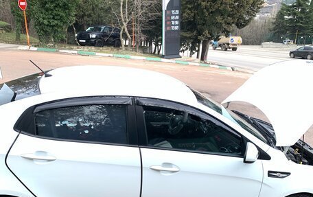 KIA Rio III рестайлинг, 2013 год, 900 000 рублей, 7 фотография