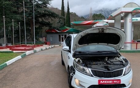 KIA Rio III рестайлинг, 2013 год, 900 000 рублей, 24 фотография