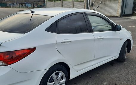 Hyundai Solaris II рестайлинг, 2011 год, 630 000 рублей, 6 фотография