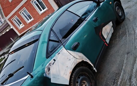 Mazda 323, 1995 год, 100 000 рублей, 3 фотография