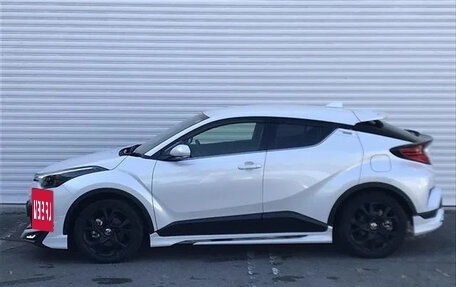 Toyota C-HR I рестайлинг, 2022 год, 1 712 000 рублей, 8 фотография