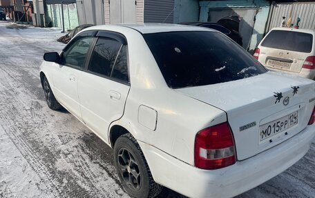 Mazda Familia, 1999 год, 169 000 рублей, 4 фотография