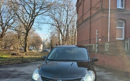 Nissan Tiida, 2010 год, 900 000 рублей, 4 фотография