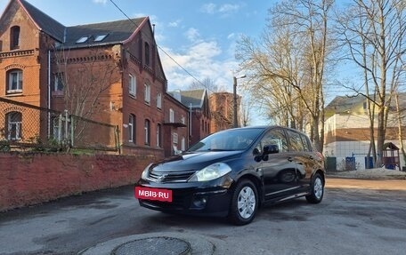 Nissan Tiida, 2010 год, 900 000 рублей, 9 фотография