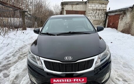 KIA Rio III рестайлинг, 2012 год, 630 000 рублей, 2 фотография