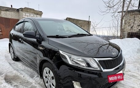 KIA Rio III рестайлинг, 2012 год, 630 000 рублей, 3 фотография