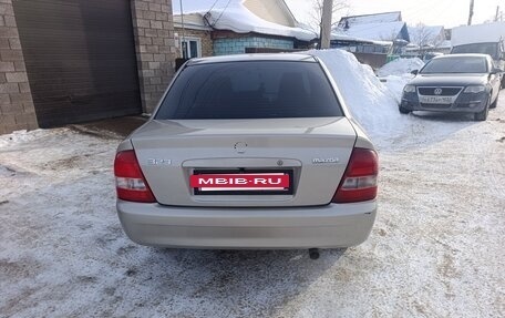 Mazda 323, 2000 год, 300 000 рублей, 4 фотография