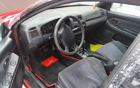 Mazda 323, 1997 год, 170 000 рублей, 13 фотография