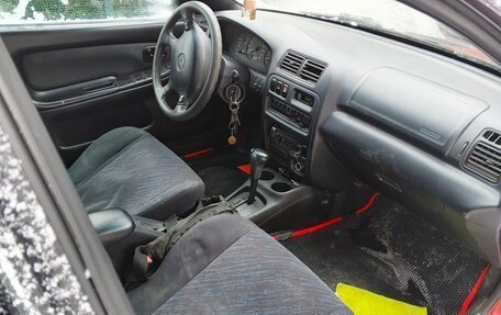 Mazda 323, 1997 год, 170 000 рублей, 15 фотография