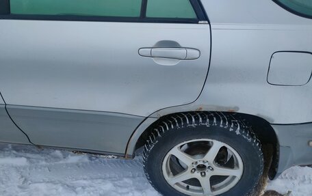 Lexus RX IV рестайлинг, 1999 год, 550 000 рублей, 3 фотография