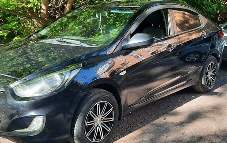 Hyundai Solaris II рестайлинг, 2011 год, 650 000 рублей, 3 фотография