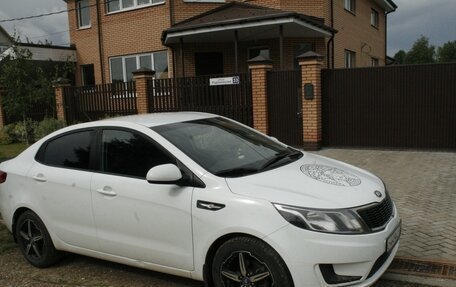 KIA Rio III рестайлинг, 2014 год, 890 000 рублей, 21 фотография