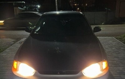 Mitsubishi Mirage VI рестайлинг, 2000 год, 1 фотография