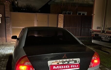 Mitsubishi Mirage VI рестайлинг, 2000 год, 2 фотография