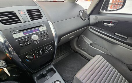 Suzuki SX4 II рестайлинг, 2013 год, 899 000 рублей, 22 фотография