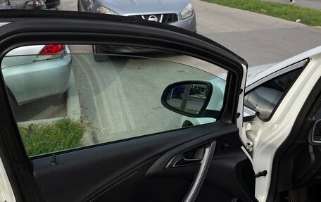 Opel Astra J, 2012 год, 700 000 рублей, 11 фотография